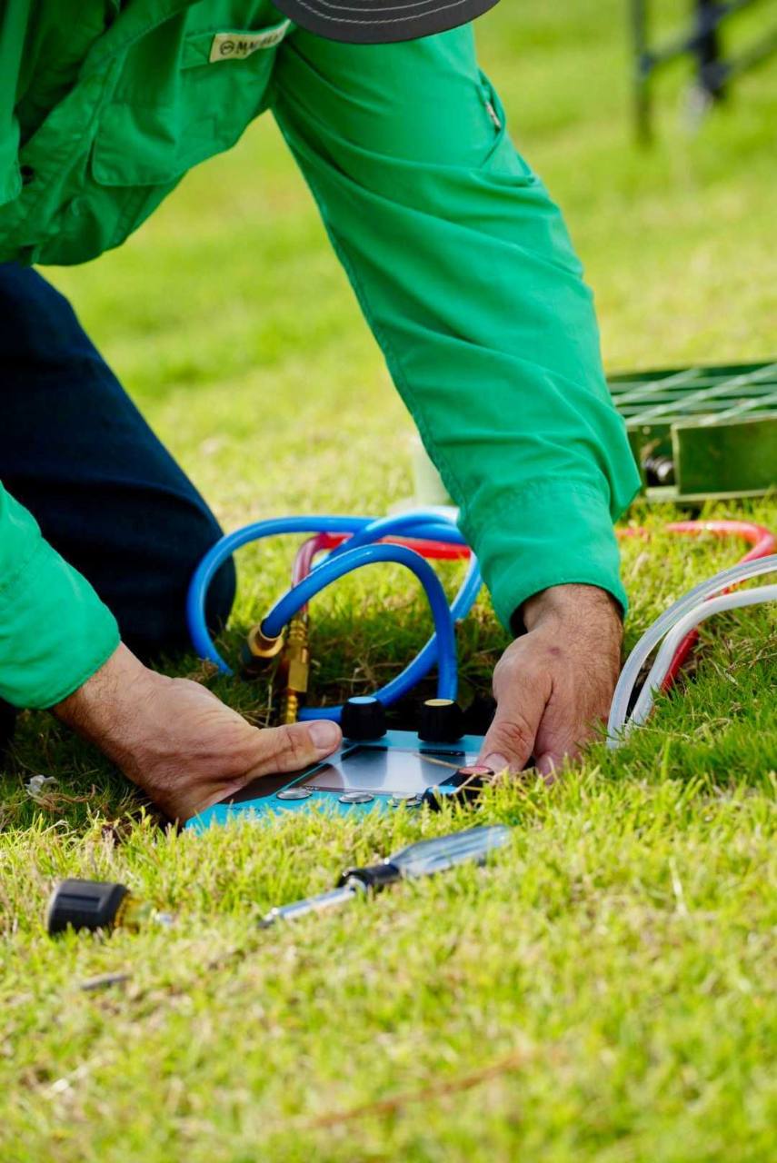 Professional backflow testing equipment in use